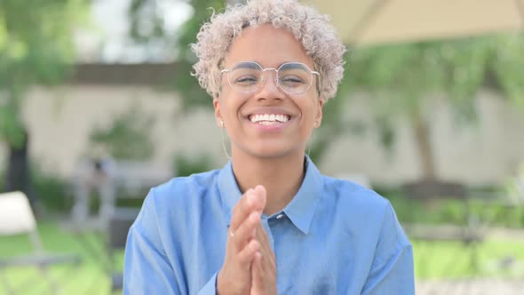 Portrait of Young African Woman Clapping Applauding