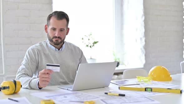 Online Payment on Laptop By Professional Young Man