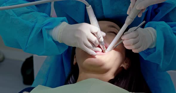 Dentist drills a tooth