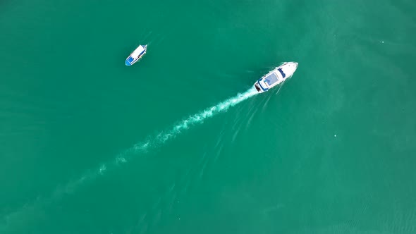 The yacht calls at the port aerial view 4 K