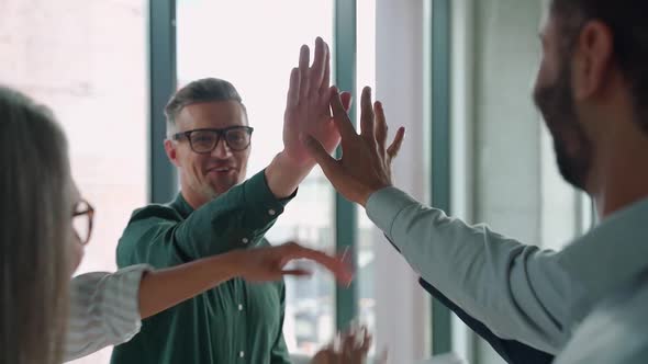 Happy Diverse International Employees Team People Give High Five in Slow Motion