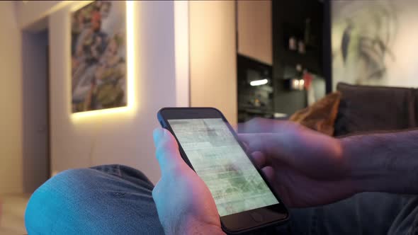 Man Using Smartphone Scrolling Through Social Media Doing Swiping Scrolling Gestures