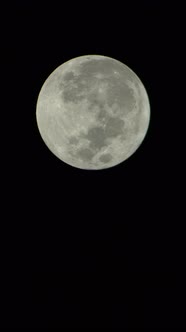 Vertical Video of the Full Moon in the Night Sky