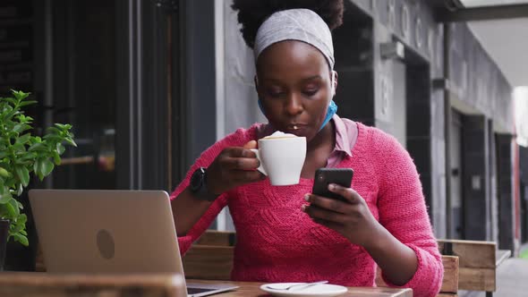 African american sitting in a cafe