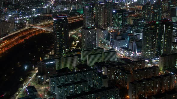 Timelapse Seoul District with Illumination and Heavy Traffic