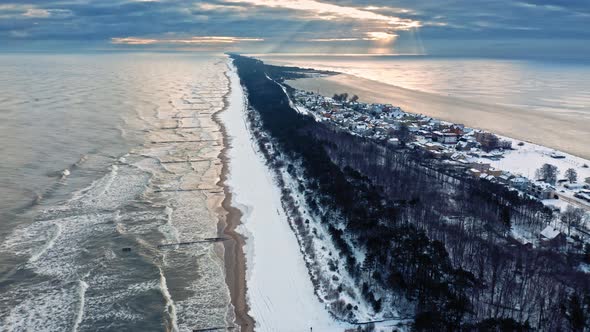 Hel peninsula and snowy beach. Baltic Sea at winter, Poland.