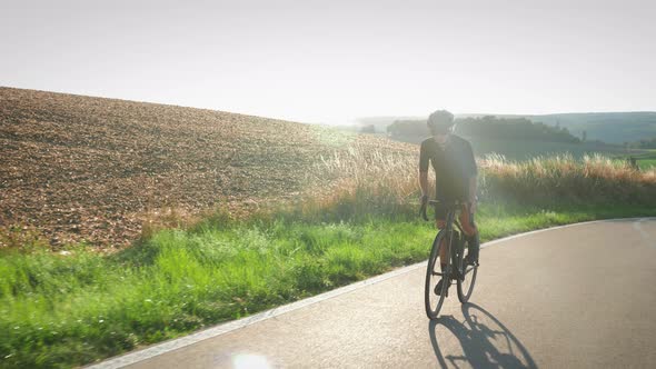 Cycling out of the saddle uphill climbing