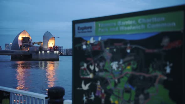 Information Map With Thames Barrier On The Background In London, England. -close up shot