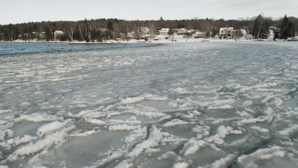 Ice forming across edge of lake shoreline