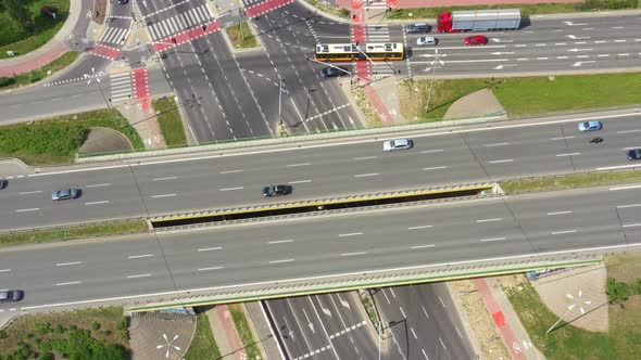 Top view over the highway, expressway and motorway, Aerial view interchange with car driving down th