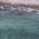 Cinematic aerial drone footage of waves crashing on the shore - VideoHive Item for Sale