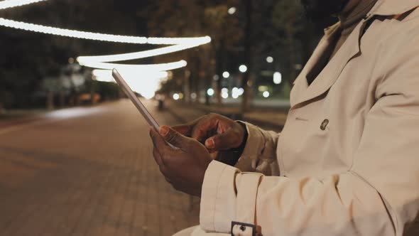 Black Man Surfing Internet On Tablet