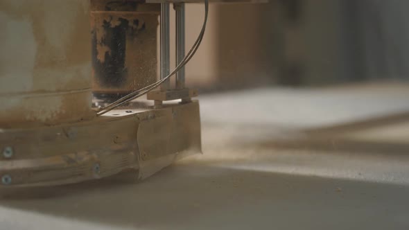 Woodworking Shop and a Machine for Processing Wooden Blanks Closeup