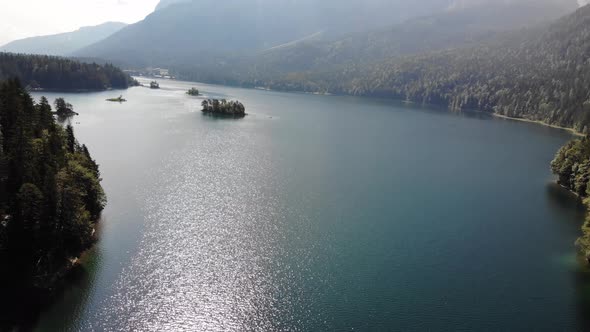 beautiful drone video of an lake and mountains, eibsee in bavaria