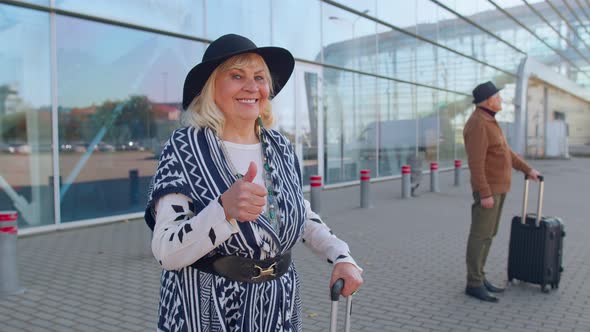 Senior Pensioner Tourist Grandmother Stay Near Airport Hall Celebrate Success Win Winner Gesture