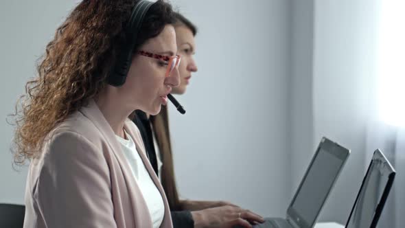 Call Center Operator Wearing Headphones