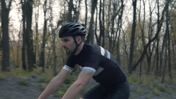 Cyclist Training Leisure Twists Pedals On Triathlon Bicycle. Gear System  And Bike Wheel. Workout.