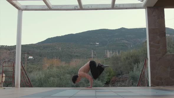 Handstand press fitness 4K in beautifully scenic location