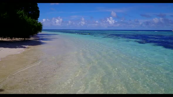 Aerial drone shot abstract of relaxing bay beach time by clear sea and white sand background of adve