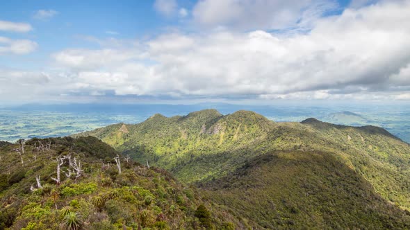 Blue Clouds Sky over Wild Mountains Forest in New Zealand Nature Landscape in Sunny Summer