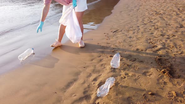 Cleaning Plastic on the Beach