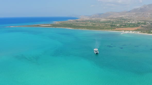 Ferry departing from Pounta Lakonia, aerial drone view