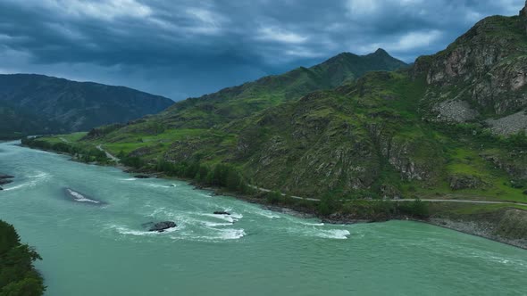 Landscape of mountains and river in summer. Aerial view