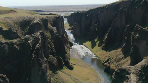 Aerial Breathtaking View of Canyon with River Gently Flowing in Iceland