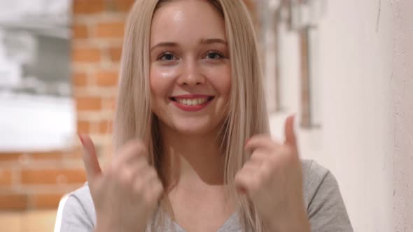 Inviting Gesture by Young Woman, Loft Background