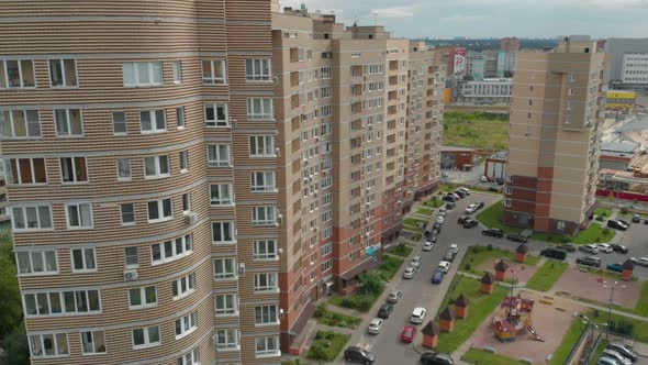 Aerial View of High Apartment House in Modern City at Summer Day, Architecture in City
