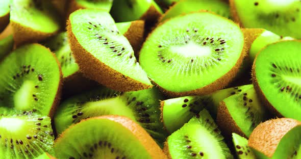 Closeup of Juicy Ripe Kiwi Slices on a Large Plate