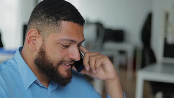 Close Up Shot of Handsome Young Man Talking on Phone