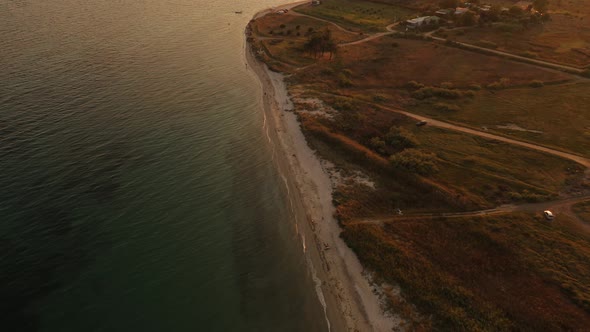 Aerial Top View Above Sunset Sand Beach Sea