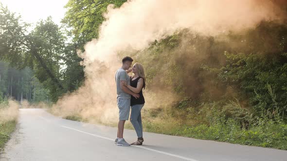 Couple kissing on a road 