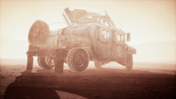 Military Patrol Car on Sunset in Desert Storm