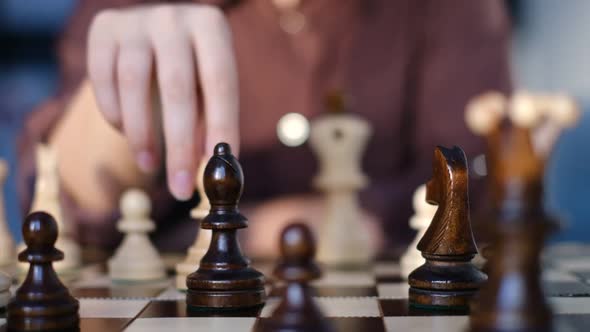 Unrecognizable Woman Playing Chess