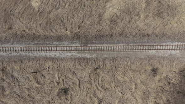 Abandoned railroad track in the field 4K aerial footage