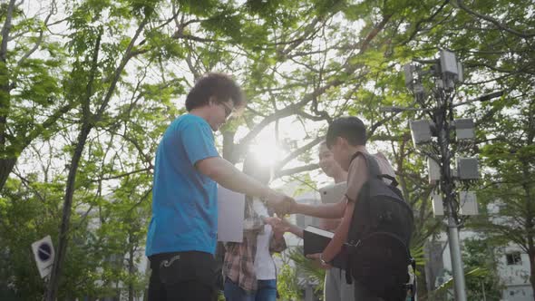 Student friends greeting together in college in morning. Education and student.
