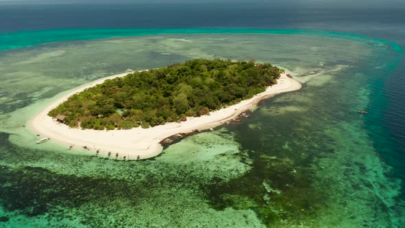 Tropical Island with Sandy Beach. Mantigue Island, Philippines