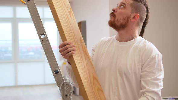 the Carpenters Secure Wooden Ash Lamellae to the Ceiling