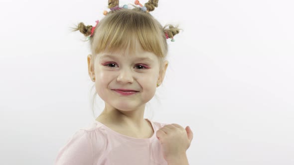 Positive Girl Emotionally Make Faces and Smile in Pink Blouse, White Background