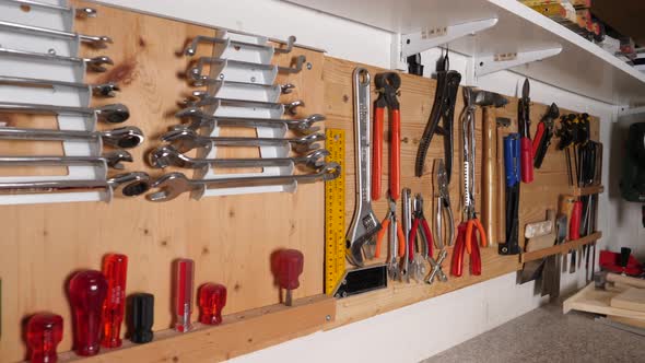 Organised tool set on wood deck at workshop