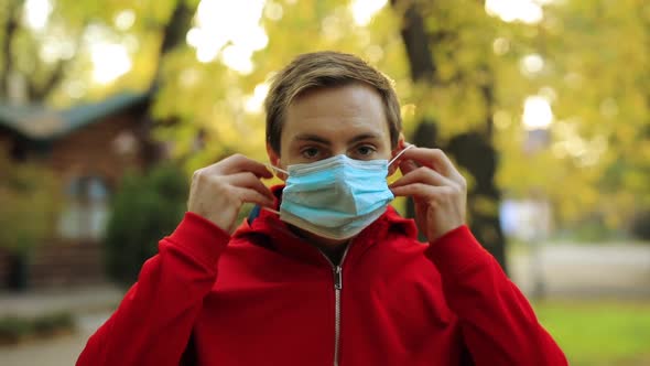 Man Wear Surgical Mask in a Park