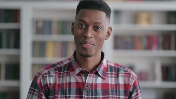 Portrait of African Man Talking on Online Video Call