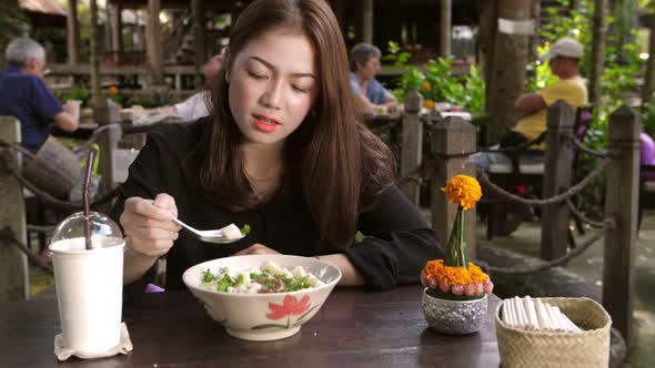Asian Girl Eating Laos Food
