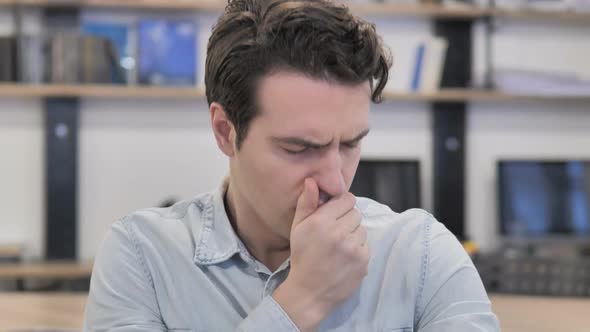 Coughing Sick Creative Man in Office