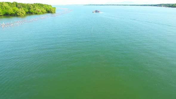 Fishing boats in the mangrove forest. Mangrove forests in the tropics of Thailand