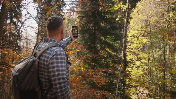 Hiker Making Autumn Selfie
