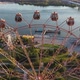 Drone View Colorful Ferris Wheel in Amusement Park on River and City Landscape - VideoHive Item for Sale
