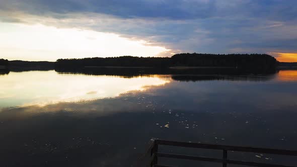 Aerial Shot of  Sunset Over Lake. Kashubia, Lake Wdzydze, Poland.